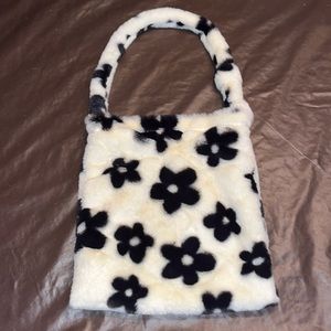 White and black flowered bag